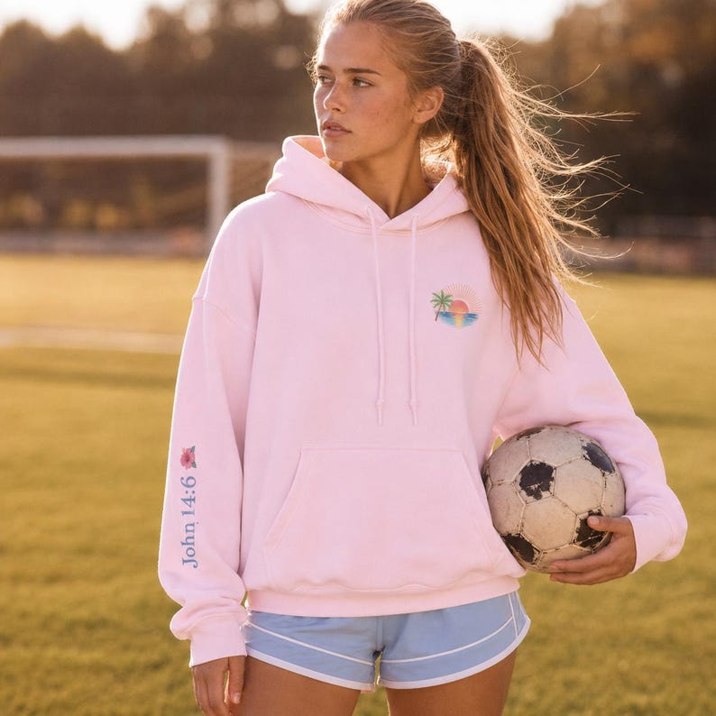 Jesus Love Theme Teenage Gift Bible Verse Hoodie Christian Women Faith Inspired Pullover Sweatshirt Teen Girl Youth Group Shirt Religious Camp Apparel Ocean Tropical Sunrise Scene Palm Tree Design His Love Lights Way Back Text John Verse