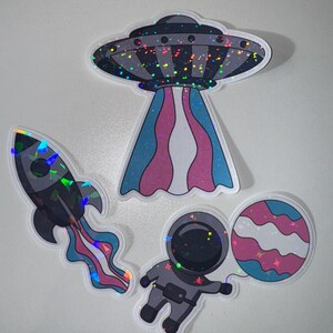 Pegatinas de orgullo transgénero con astronauta, cohete y ovni con purpurina, calcomanías de bandera del orgullo holográfica del espacio LGBTQ+, pegatinas del mes del orgullo galáctico