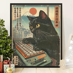 May include: A framed wall art print featuring a black cat typing on a vintage computer keyboard. The background displays a stylized cityscape and Mount Fuji under a red sun. Japanese text is visible on the left and right sides of the print.