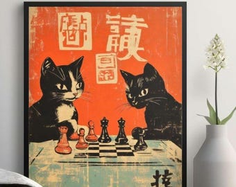 May include: Framed vintage-style print featuring two cats playing chess. One cat is black and white, the other is solid black. The background is orange with Japanese characters. The chess board is blue and white.