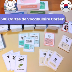 Peut inclure: Un ensemble de 500 cartes de vocabulaire coréen présentant des caractères coréens, une romanisation et des définitions en français. Les cartes sont organisées en piles et incluent des cartes individuelles avec illustrations et conjugaisons.