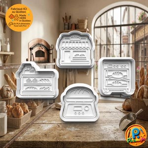 Könnte beinhalten: Set aus fünf weißen Kunststoff-Ausstechern in Form einer Bäckerei, eines Ofens, einer Brotauslage und einer Waage. Die Ausstecher liegen auf einem Holztisch, im Hintergrund Körbe mit Brot. Das Bild enthält den Text "Made HERE in Quebec".