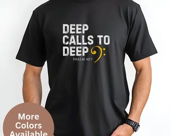 May include: Black t-shirt with white text that reads "Deep Calls to Deep" with a yellow bass clef and the text "Psalm 42:7".