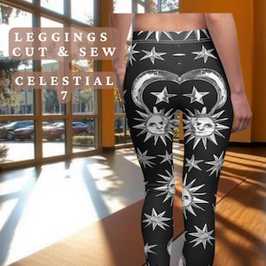 Puede incluir: Leggings negros con un estampado celestial blanco con lunas, estrellas y soles. Los leggings están cortados y cosidos para un ajuste cómodo. El texto "Crafty Harmonies Comfortably Beautiful CraftyHarmonies.etsy.com Leggings Cut & Sew Celestial 7" es visible en la imagen.