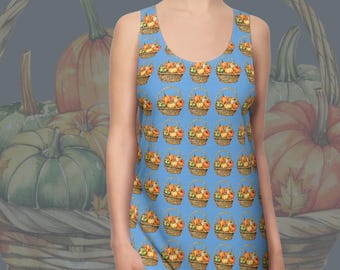 May include: A blue racerback dress with a repeating pattern of pumpkin baskets. The dress has a scoop neckline and is sleeveless. The background includes a large basket and pumpkins. The text "RACERBACK DRESS" and "PUMPKIN BASKET 1" are visible.