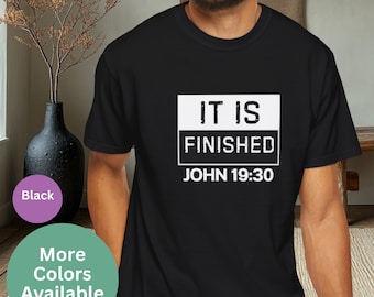 May include: Black t-shirt with white text that reads "IT IS FINISHED JOHN 19:30".