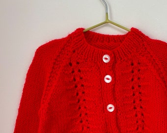 red handmade 6-9 month knit for bespoke design