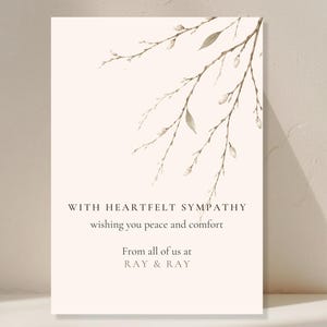 May include: A sympathy card with a cream background and a watercolor illustration of delicate branches with leaves. The text reads "WITH HEARTFELT SYMPATHY wishing you peace and comfort. From all of us at RAY & RAY."