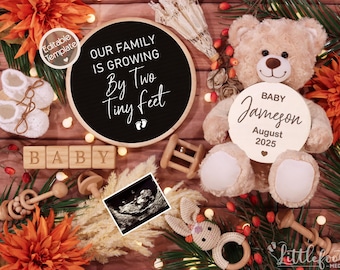 May include: A black chalkboard sign with the text "Our family is growing by two tiny feet" with a teddy bear holding a wooden sign with the text "Baby Jameson August 2025".