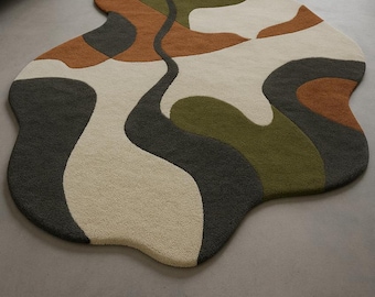 Alfombra abstracta con formas orgánicas, tejida a mano. Moderna alfombra de lana irregular en tonos tierra para sala de estar y dormitorio.