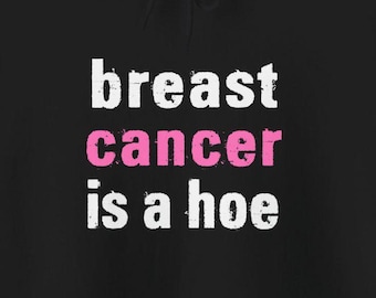 May include: Black hoodie with white text that reads "breast cancer is a hoe" with the word "cancer" in pink.