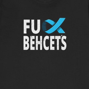 May include: Black t-shirt with white text that reads "F**k Behcet's" and a blue ribbon.
