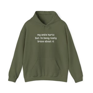 My Ankle Hurts But Im Being Really Brave About It hoodies Funny Injuries Sprains Twisted Broken Ankles Humor military green hooded sweatshirts White Lettering