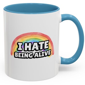 Funny Dark Humor 11 ounce ceramic mugs I Hate Being Alive Rainbow Snarky Sarcastic Tee with Depression Vibes white coffee mug with a rainbow and in white I hate being alive red handle