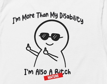 May include: A white t-shirt with a black and white illustration of a cartoon character wearing sunglasses and giving the middle finger. The text "I'm More Than My Disability I'm Also A Bitch" is printed on the shirt. The word "MATURE" is printed in red at the bottom of the shirt.