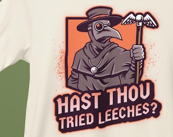 May include: White t-shirt with a graphic of a plague doctor holding a staff with wings. The text "Hast thou tried leeches?" is printed below the image.