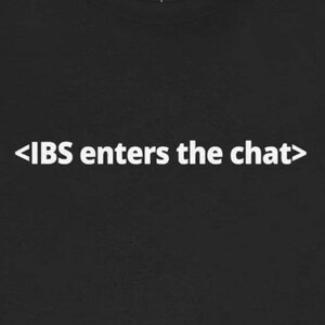 May include: Black t-shirt with white text that reads "<IBS enters the chat>".