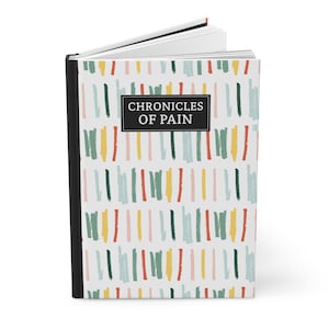 Chronic Pain Journal  Chronicles of Pain Hardcover Lined Journal for Spoonies Medical Planner a journal book with abstract lines in different colors with black box and binding in white lettering chronicles of pain