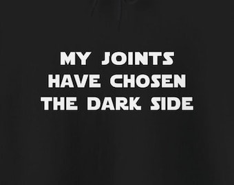 May include: Black hoodie with white text that reads "My Joints Have Chosen The Dark Side."