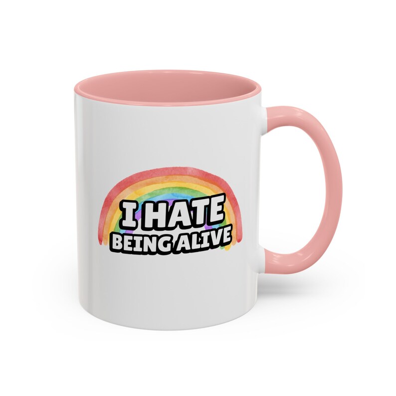 Funny Dark Humor 11 ounce ceramic mugs I Hate Being Alive Rainbow Snarky Sarcastic Tee with Depression Vibes white coffee mug with a rainbow and in white I hate being alive pink handle