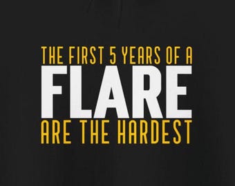 May include: Black hoodie with yellow text that reads "The first 5 years of a FLARE are the hardest."