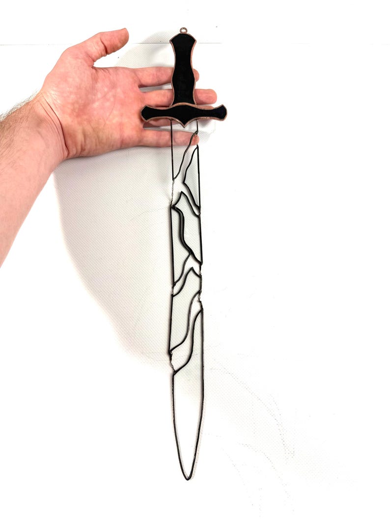 halloween suncatcher
halloween decor 2025
scary home decor
blade suncatcher
sword suncather
stained glass sword
glass elvin sword
glass elvin blade
elvin sword broken
rantasy sword glass
hanging sword decor
sword wall art
gift for geek