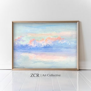 May include: Watercolor painting of a serene sky with pastel colors. The artwork features a golden frame and a reflection of the clouds in the water below. The text "ZCR | Art Collective" is visible at the bottom.