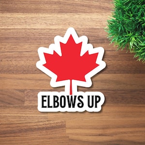 May include: A white sticker with a red maple leaf and the text "ELBOWS UP" in black.