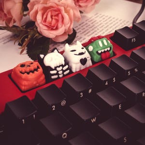 ハロウィンキーキャップ 3Dプリント STLファイル | 楽しくて風変わりなハロウィン要素 | かわいいカボチャ、ゴースト、モンスターのデザイン | 3DプリントDIYプロジェクト