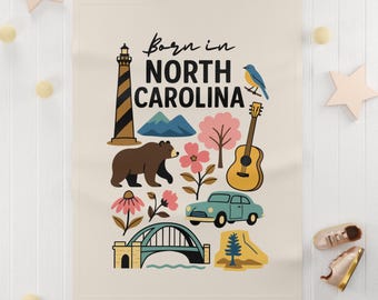 Born in North Carolina Baby Fleece Blanket | State Icons Lighthouse Bear Guitar