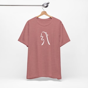 May include: A heather red t-shirt with a white abstract design of a stylised chicken.
