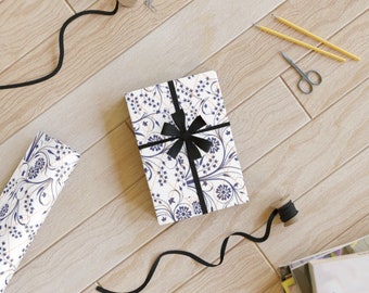 Wrapping paper roll, blue/gold pattern