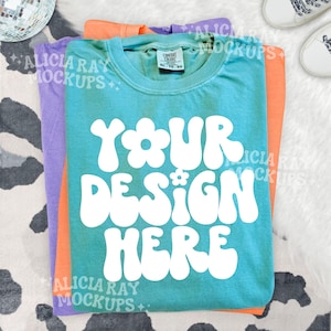 May include: A white ceramic mug with a black handle and the text "But First, Coffee" in a handwritten style. The mug is on a white surface. The mug is approximately 4 inches tall.