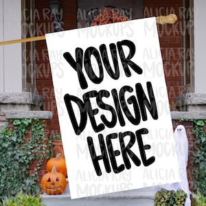May include: A white sign with the text "YOUR DESIGN HERE" in black handwritten font. The sign is propped up against a brick wall with a ghost and pumpkins in the foreground.