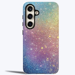 May include: A phone case with a glittery rainbow ombre design and gold stars. The case is made of a durable material and is designed to protect your phone from scratches and drops.