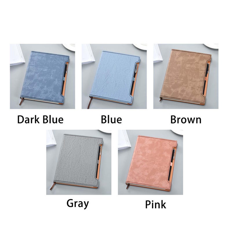 May include: Six different colored notebooks with a pen attached to the cover. The colors are dark blue, blue, brown, gray, pink, and black.