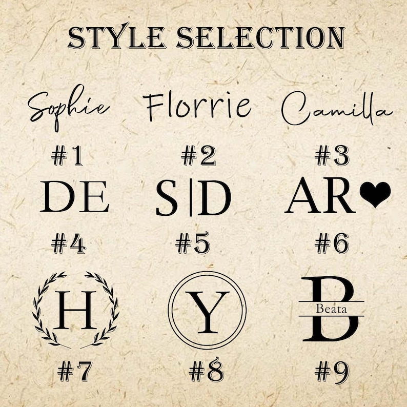 May include: Nine different monogram styles for a personalised gift. The styles are numbered 1 through 9. The styles include initials, a heart, a wreath, and a line.