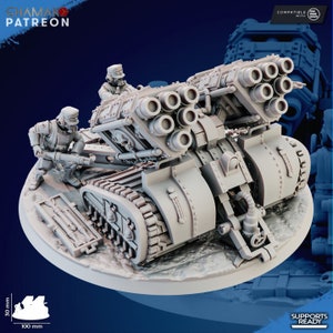 Könnte beinhalten: Ein graues, detailliertes Plastikmodell eines Kettenfahrzeugs mit einer großen, mehrläufigen Kanone. Das Fahrzeug ist 100 mm lang und 30 mm hoch. Das Modell ist kompatibel mit One Page Rules.