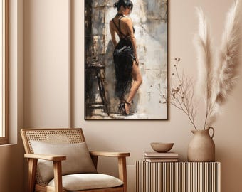 May include: A framed art print depicts a woman in a black dress, leaning against a wall. The artwork is in a muted color palette with a focus on texture and shadow. A wooden chair with a beige cushion and a side table with a vase are in the foreground.