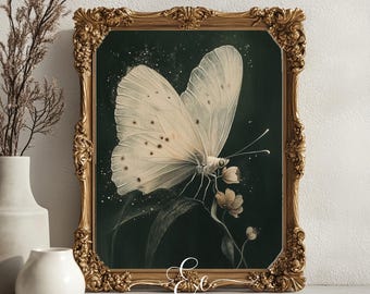 May include: A white butterfly with black spots is perched on a green stem with small white flowers. The butterfly is in a gold ornate frame against a white background. The text "Echoes & Ember" is at the bottom of the frame.