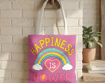 May include: A pink tote bag with white handles, featuring the words "HAPPINESS IS POWER" in yellow and a rainbow design. The design includes a heart and lightning bolt.