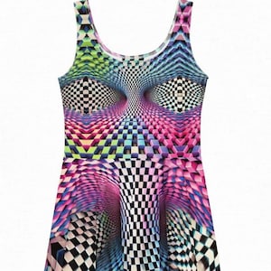 May include: Sleeveless dress with a vibrant, geometric pattern. The design features a repeating cube pattern in shades of pink, purple, blue, green, and black and white, creating a 3D optical illusion. The dress has a scoop neckline and a flared skirt.