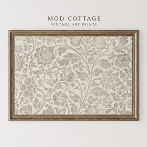 May include: A framed print with a vintage floral pattern in shades of gray and white. The pattern features intricate details of leaves and flowers.