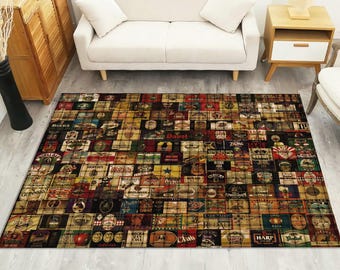 May include: A rectangular area rug featuring a grid-like collage of various vintage-style beer brand labels and logos in a palette of brown, red, gold, and black. The design displays numerous distinct rectangular sections with text and graphics.