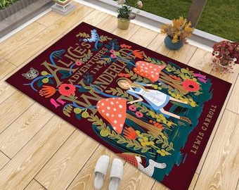 May include: A rectangular floor mat with a dark maroon background featuring a colorful illustration of Alice in Wonderland. The design includes the text Alice's Adventures in Wonderland by Lewis Carroll, a Cheshire cat, mushrooms, and floral motifs.