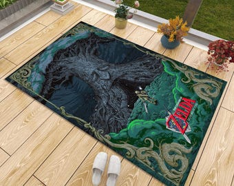 May include: A rectangular floor mat featuring a dark, detailed illustration of a large, gnarled tree with a character standing on a rocky cliff. The design includes green accents, swirling vine patterns, and the red text The Legend of Zelda Ocarina of Time.