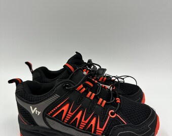 Bambin 12, chaussures de randonnée basses noires avec touches d'orange vif, embout en cuir