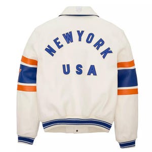 May include: A set of three ceramic mugs with a speckled, matte finish. The mugs are in shades of cream, light gray, and dark gray. Each mug has a simple, minimalist design and a rounded handle.