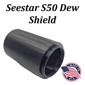May include: A black SeeStar S50 Dew Shield made in the USA. The shield is a cylindrical tube with a black finish and a smooth surface.