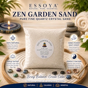 May include: A clear plastic bag containing 340g of fine white quartz crystal sand labelled Zen Garden Sand. The bag features a circular sticker with a stacked stone graphic and text detailing the product as triple sifted and hand picked.